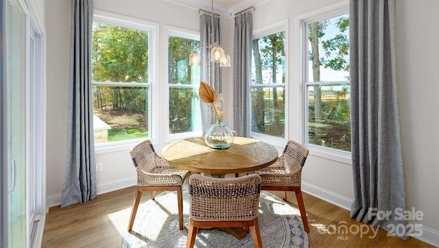 4129 Duplin Dr, Charlotte, NC 28214 - dining room with wood finished floors and plenty of natural light