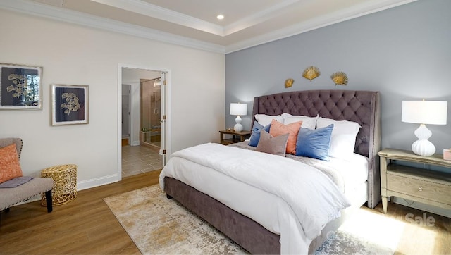 4129 Duplin Dr, Charlotte, NC 28214 - bedroom featuring wood finished floors, ornamental molding, recessed lighting, and ensuite bathroom