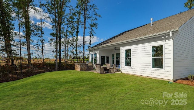 4129 Duplin Dr, Charlotte, NC 28214 - rear view of property with a ceiling fan, a lawn, and a patio