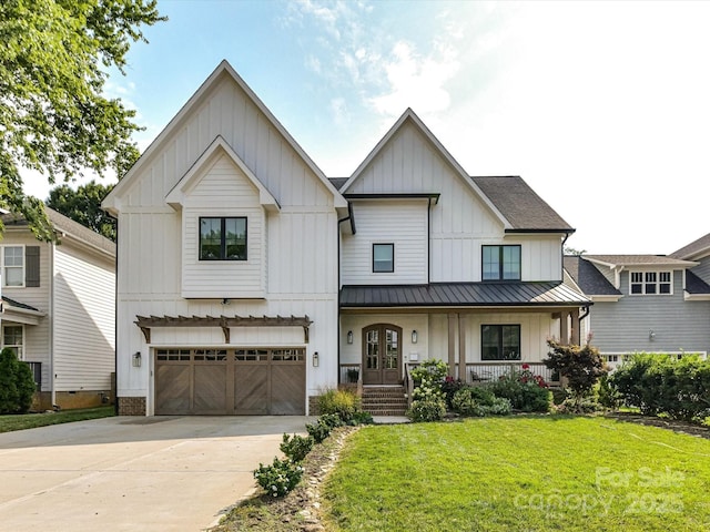 615 Melbourne Ct, Charlotte, NC 28209 - view of front of property featuring board and batten siding, covered porch, a front lawn, concrete driveway, and a garage
