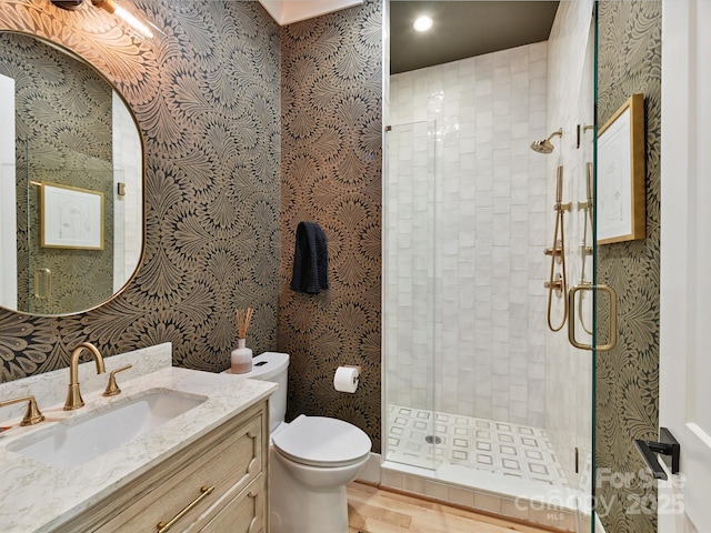 615 Melbourne Ct, Charlotte, NC 28209 - full bath with vanity, a shower stall, wallpapered walls, wood finished floors, and recessed lighting