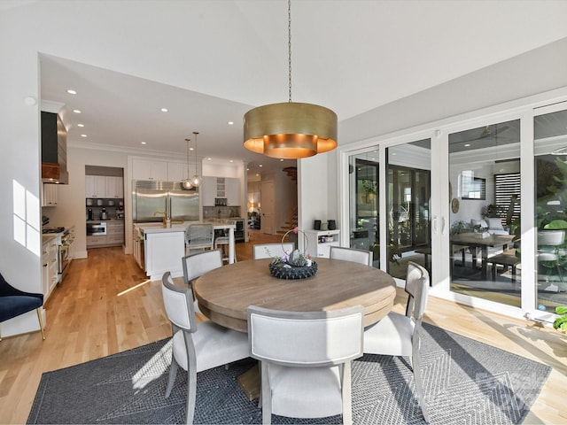 615 Melbourne Ct, Charlotte, NC 28209 - dining room with light wood-type flooring, recessed lighting, and ornamental molding