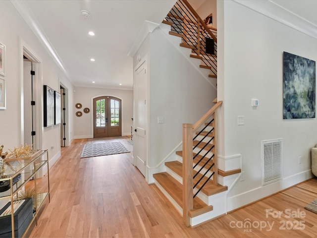 615 Melbourne Ct, Charlotte, NC 28209 - foyer entrance with stairs, light wood-type flooring, and recessed lighting
