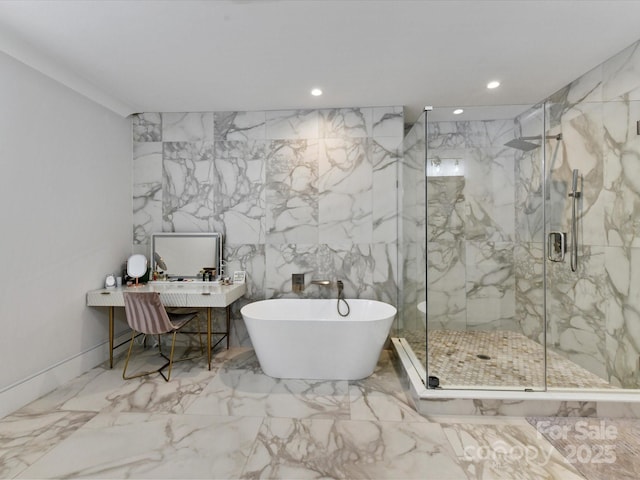 615 Melbourne Ct, Charlotte, NC 28209 - full bathroom with marble tiled floors, a soaking tub, recessed lighting, a marble finish shower, and vanity