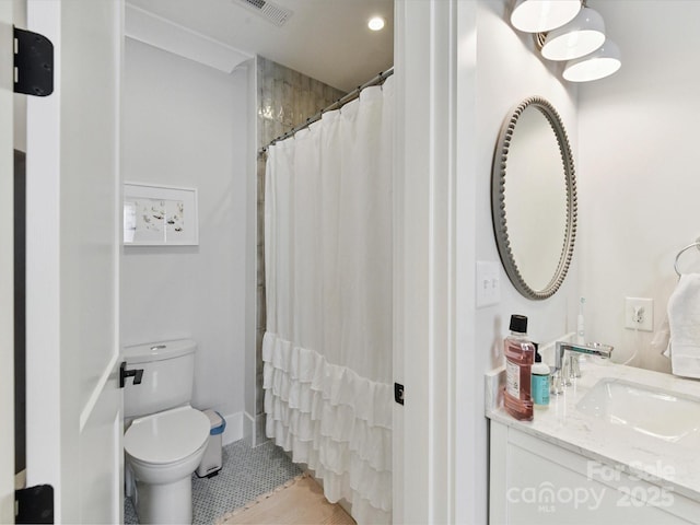 615 Melbourne Ct, Charlotte, NC 28209 - bathroom with vanity, a shower with shower curtain, and tile patterned flooring