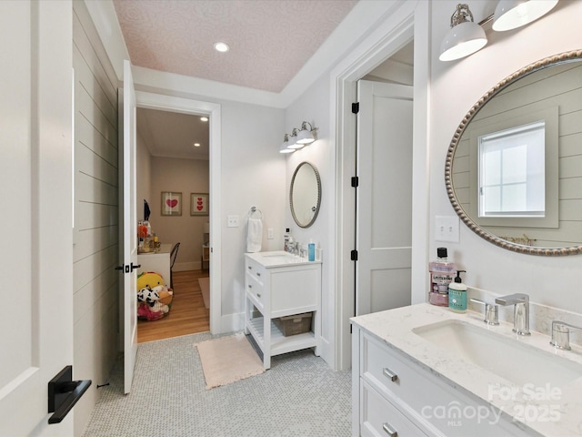 615 Melbourne Ct, Charlotte, NC 28209 - full bathroom featuring two vanities and recessed lighting