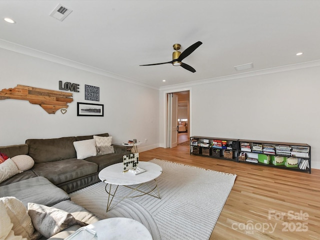 615 Melbourne Ct, Charlotte, NC 28209 - living room with wood finished floors, crown molding, a ceiling fan, and recessed lighting
