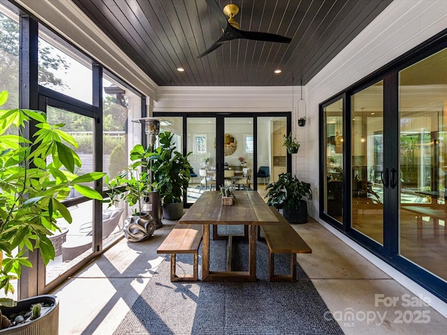 615 Melbourne Ct, Charlotte, NC 28209 - sunroom / solarium with outdoor dining space, a ceiling fan, concrete floors, and wooden ceiling