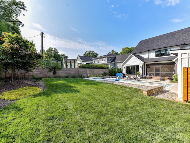 615 Melbourne Ct, Charlotte, NC 28209 - fenced backyard featuring a sunroom, a pool, and a patio area