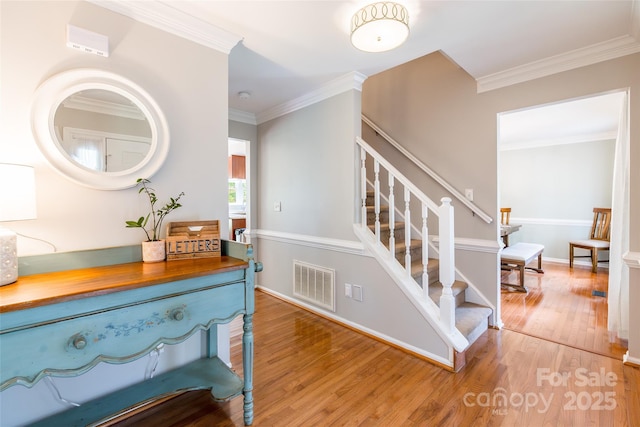 1220 Merribrook Dr, Matthews, NC 28105 - stairs with wood finished floors and ornamental molding