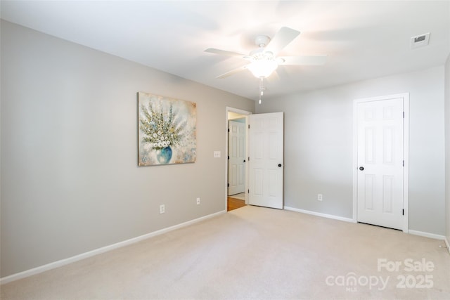 1220 Merribrook Dr, Matthews, NC 28105 - unfurnished bedroom with light colored carpet and a ceiling fan