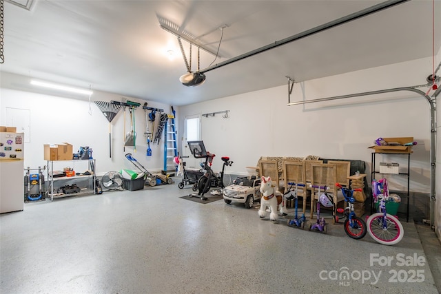 1220 Merribrook Dr, Matthews, NC 28105 - garage with freestanding refrigerator and a garage door opener
