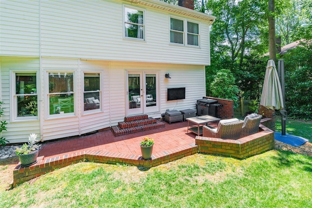 1220 Merribrook Dr, Matthews, NC 28105 - rear view of house with a patio, a lawn, french doors, and a chimney