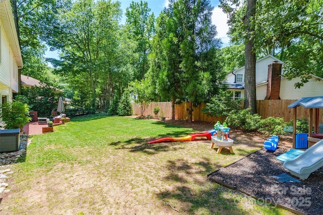 1220 Merribrook Dr, Matthews, NC 28105 - fenced backyard featuring a playground
