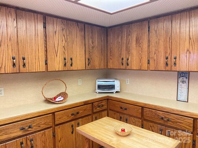 268 Poor Boy Ln, Whittier, NC 28789 - kitchen featuring brown cabinets