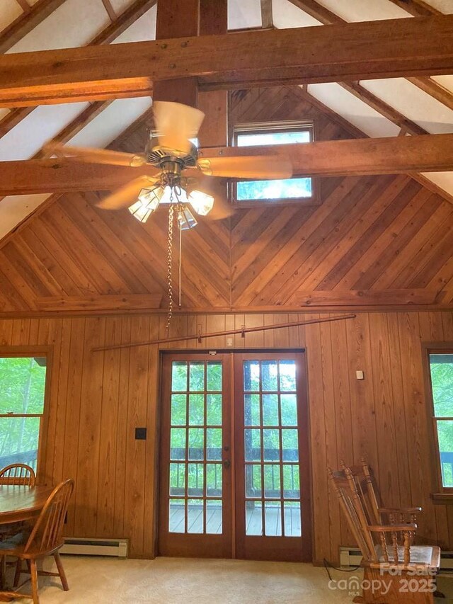 268 Poor Boy Ln, Whittier, NC 28789 - detailed view of wood walls, ceiling fan, beam ceiling, a baseboard radiator, and a baseboard heating unit