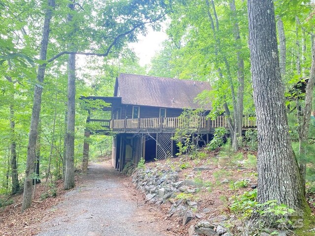 268 Poor Boy Ln, Whittier, NC 28789 - view of front of property with a deck and a shingled roof