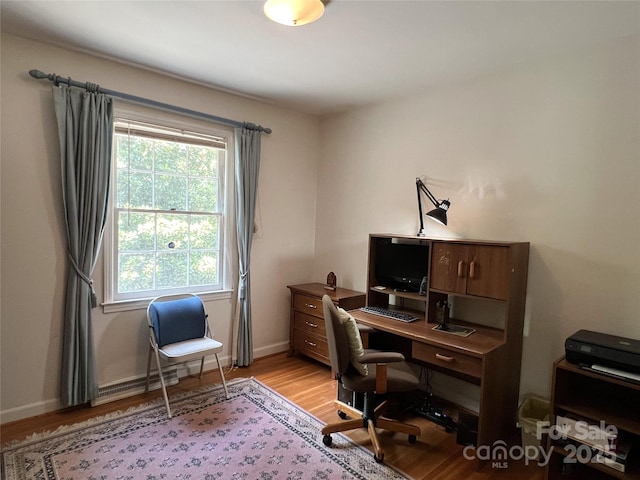 5938 Sharon Rd, Charlotte, NC 28210 - home office featuring wood finished floors and baseboards