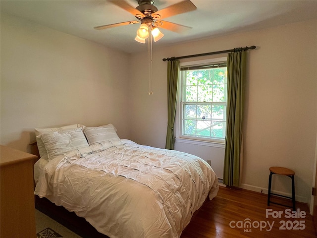 5938 Sharon Rd, Charlotte, NC 28210 - bedroom featuring wood finished floors and ceiling fan