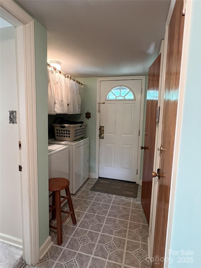 5938 Sharon Rd, Charlotte, NC 28210 - washroom featuring cabinet space, separate washer and dryer, and tile patterned flooring