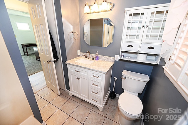 112 Lovelady Rd, Valdese, NC 28690 - half bath featuring vanity, tile patterned flooring, and a chandelier