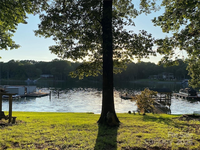 4927 Vagabond Ln, Sherrills Ford, NC 28673 - water view featuring a floating dock and a forest