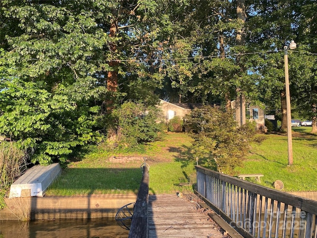 4927 Vagabond Ln, Sherrills Ford, NC 28673 - deck featuring a lawn and view of scattered trees