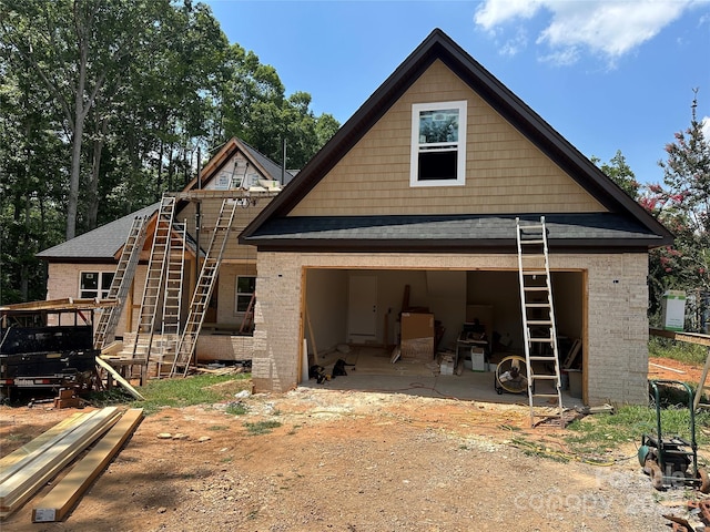 1500 Crowders Creek Rd, Gastonia, NC 28052 - back of property with brick siding, stairs, an outbuilding, and a shingled roof