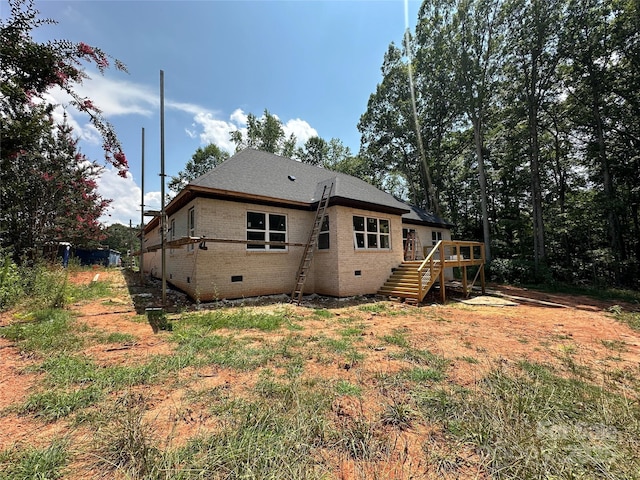 1500 Crowders Creek Rd, Gastonia, NC 28052 - back of property with stairway, brick siding, a deck, crawl space, and roof with shingles