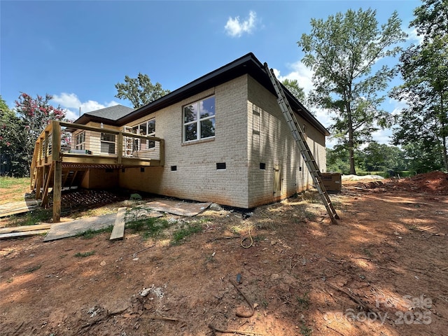 1500 Crowders Creek Rd, Gastonia, NC 28052 - rear view of house featuring crawl space, brick siding, and a deck