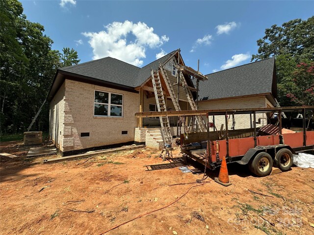 1500 Crowders Creek Rd, Gastonia, NC 28052 - back of property featuring crawl space, brick siding, and a shingled roof