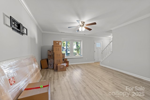 4918 Tyne Dr, Durham, NC 27703 - living area with ceiling fan, stairs, light wood-type flooring, and crown molding