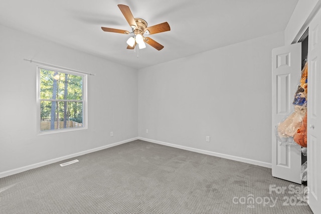 4918 Tyne Dr, Durham, NC 27703 - carpeted empty room with ceiling fan and baseboards