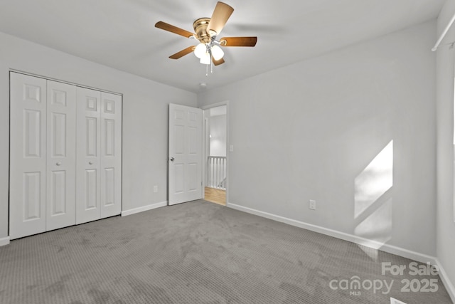 4918 Tyne Dr, Durham, NC 27703 - unfurnished bedroom with carpet flooring, a closet, and ceiling fan