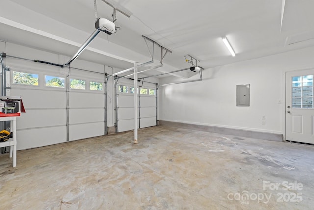 4918 Tyne Dr, Durham, NC 27703 - garage with electric panel and a garage door opener