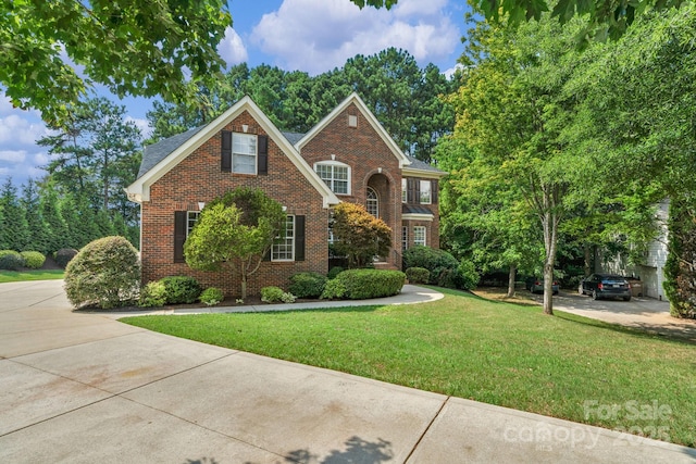 8606 Gresham Dr, Waxhaw, NC 28173 - view of front of home featuring brick siding and a front yard