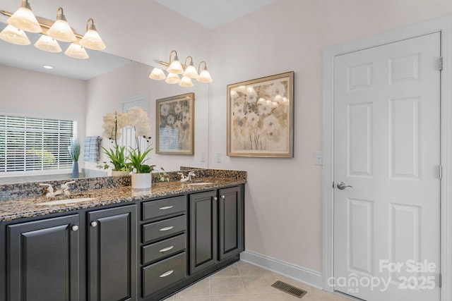 8606 Gresham Dr, Waxhaw, NC 28173 - bathroom with double vanity and tile patterned flooring
