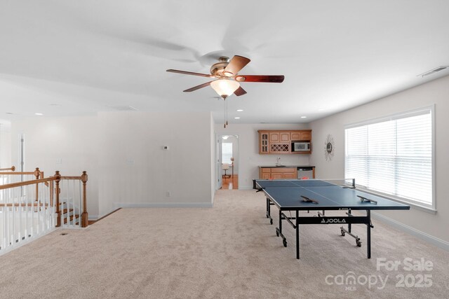 8606 Gresham Dr, Waxhaw, NC 28173 - rec room with a ceiling fan, light carpet, and recessed lighting