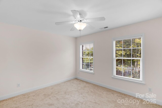 8606 Gresham Dr, Waxhaw, NC 28173 - empty room featuring carpet and a ceiling fan