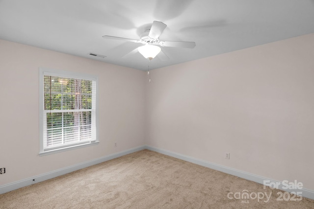 8606 Gresham Dr, Waxhaw, NC 28173 - unfurnished room with light colored carpet and ceiling fan