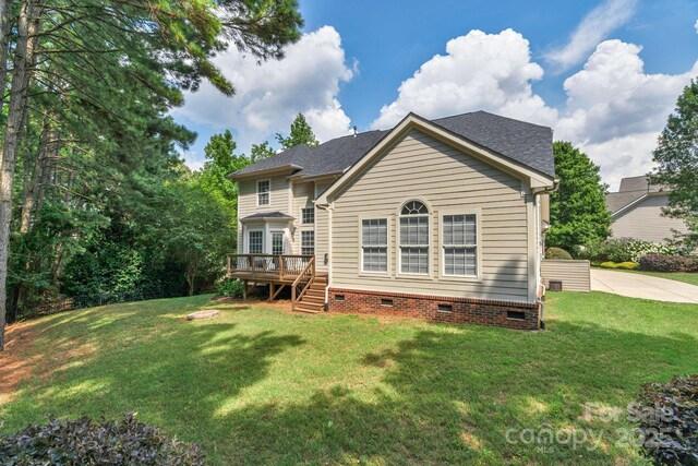 8606 Gresham Dr, Waxhaw, NC 28173 - rear view of house featuring crawl space, a wooden deck, a lawn, and a shingled roof