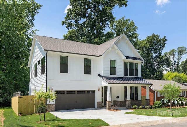 4114 Mantle Ct, Charlotte, NC 28205 - modern inspired farmhouse with a porch, a standing seam roof, a garage, concrete driveway, and roof with shingles