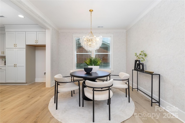 4114 Mantle Ct, Charlotte, NC 28205 - dining space featuring ornamental molding, light wood finished floors, and a chandelier
