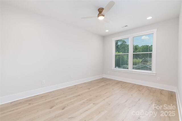 4114 Mantle Ct, Charlotte, NC 28205 - empty room featuring light wood-style flooring, a ceiling fan, and recessed lighting