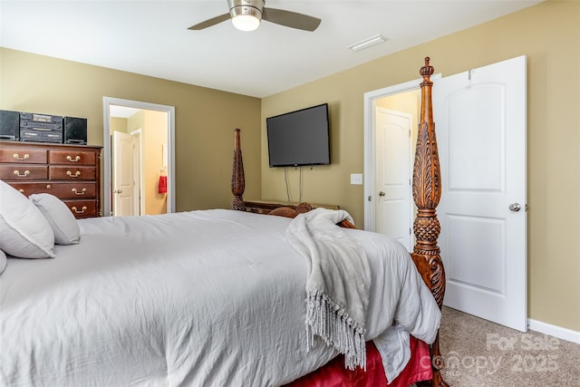 127 Tranquil Ct Unit 18A, Locust, NC 28097 - bedroom featuring carpet floors, ceiling fan, and ensuite bath