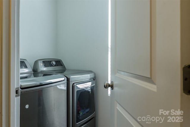 127 Tranquil Ct Unit 18A, Locust, NC 28097 - washroom with washer and clothes dryer