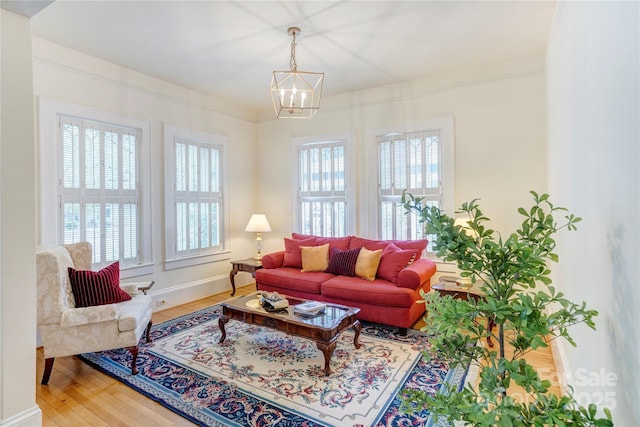 156 Union St N, Concord, NC 28025 - living room with a chandelier and wood finished floors