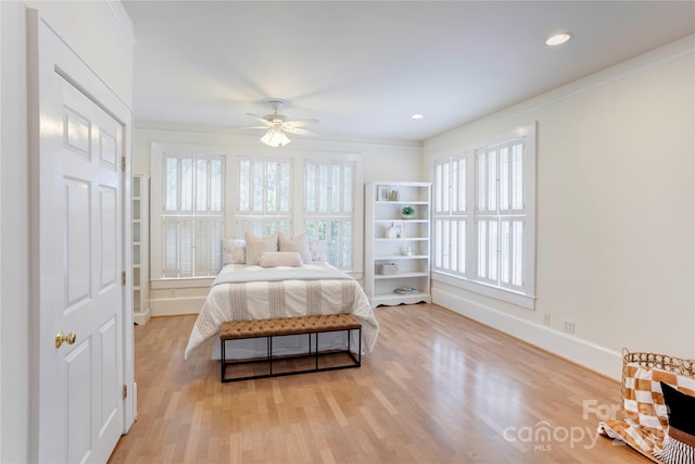 156 Union St N, Concord, NC 28025 - bedroom with ornamental molding, multiple windows, wood finished floors, recessed lighting, and a ceiling fan