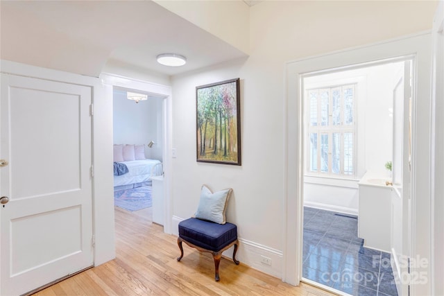 156 Union St N, Concord, NC 28025 - hallway with light wood-style flooring and baseboards