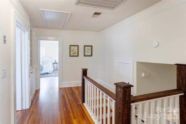 156 Union St N, Concord, NC 28025 - corridor with attic access, an upstairs landing, and wood finished floors